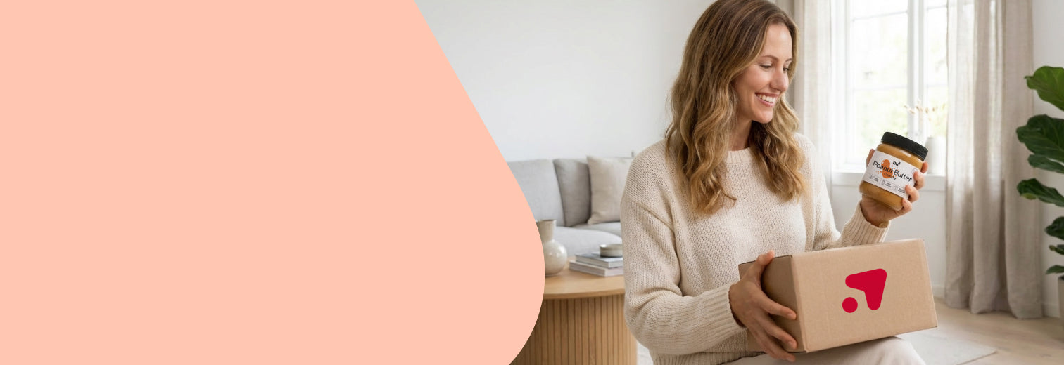 Frau mit Redcare Apotheke Paket und nu3 Erdnussbutter