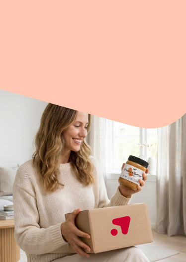 Frau mit Redcare Apotheke Paket und nu3 Erdnussbutter